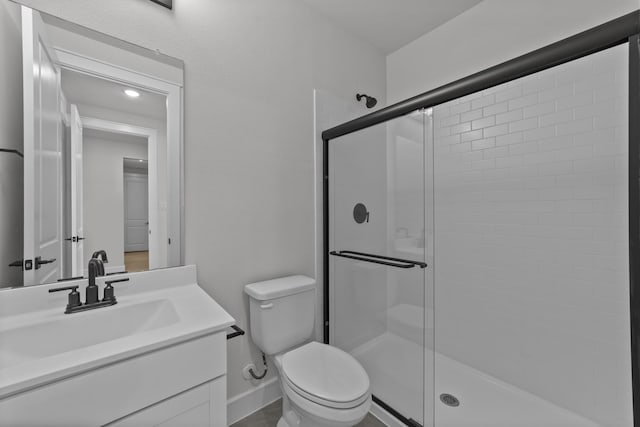 1330 Caleb Rd, Van Alstyne, TX 75495 - bathroom featuring a stall shower, toilet, vanity, and baseboards