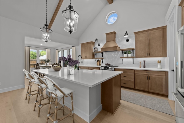 1330 Caleb Rd, Van Alstyne, TX 75495 - kitchen with island exhaust hood, open shelves, a sink, brown cabinetry, and backsplash