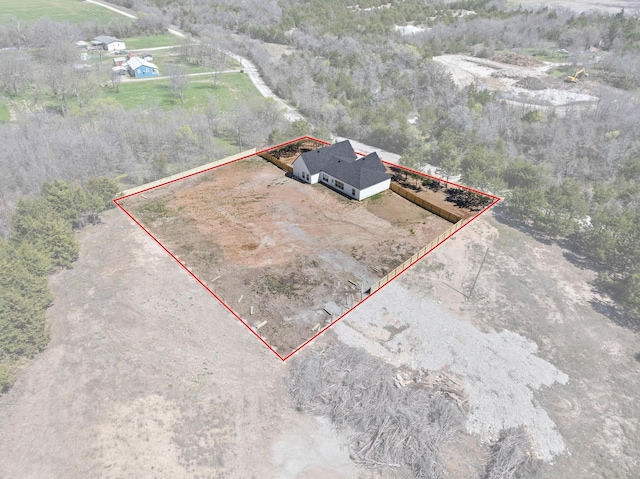 birds eye view of property featuring a rural view