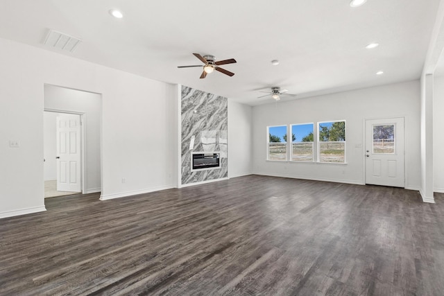 unfurnished living room with dark wood-style floors, recessed lighting, a ceiling fan, and visible vents