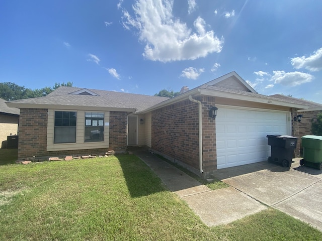 4220 Staghorn Cir N, Fort Worth, TX 76137 - ranch-style house with brick siding, driveway, a front lawn, and an attached garage