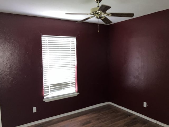 4220 Staghorn Cir N, Fort Worth, TX 76137 - unfurnished room featuring dark wood finished floors, a ceiling fan, and baseboards
