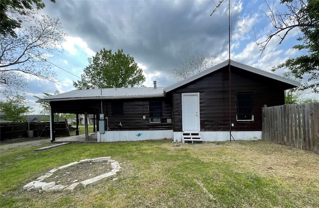 106 N 4th St, Celeste, TX 75423 - back of property with a yard, entry steps, and fence