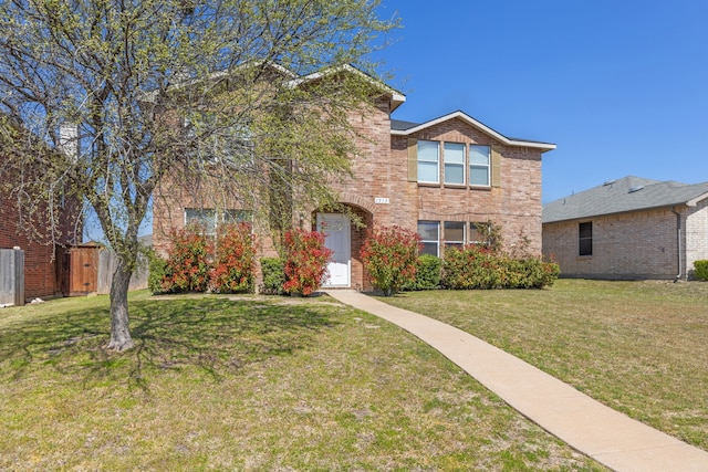 traditional-style house with brick siding