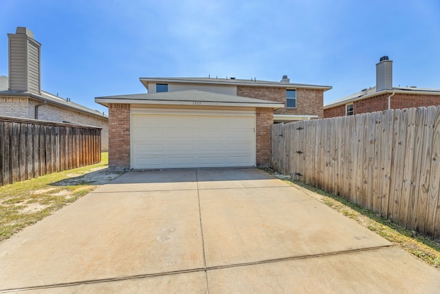 garage with fence