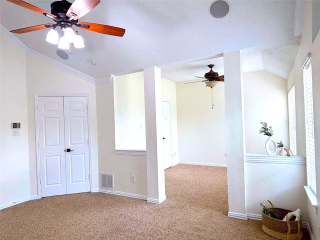 2212 Remmington Dr, Flower Mound, TX 75028 - carpeted empty room featuring lofted ceiling, a ceiling fan, baseboards, and crown molding