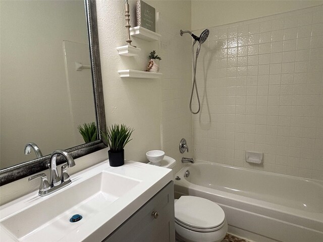 2212 Remmington Dr, Flower Mound, TX 75028 - bathroom featuring toilet, shower / washtub combination, and vanity