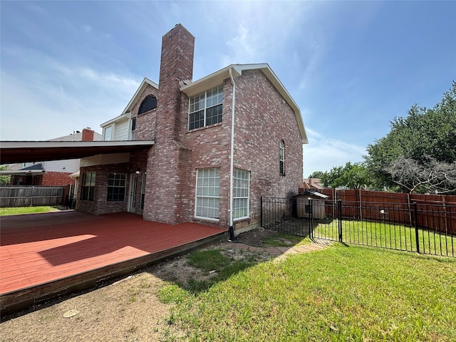 2212 Remmington Dr, Flower Mound, TX 75028 - rear view of property with a chimney, brick siding, a wooden deck, and a gate