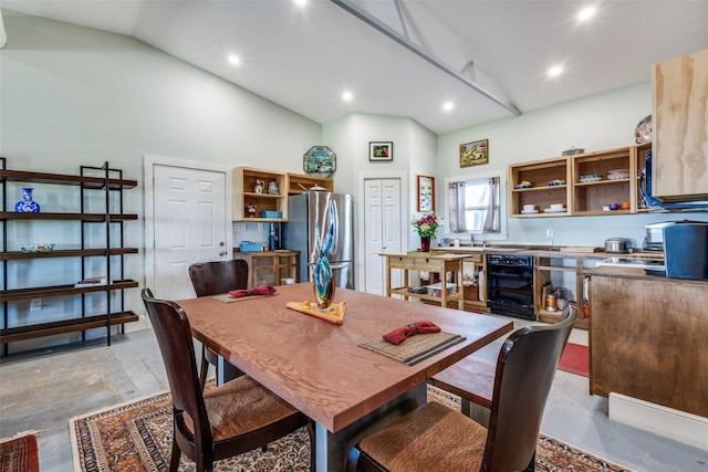 dining space with concrete floors, high vaulted ceiling, wine cooler, and recessed lighting