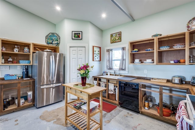 kitchen featuring freestanding refrigerator, black dishwasher, unfinished concrete flooring, and open shelves