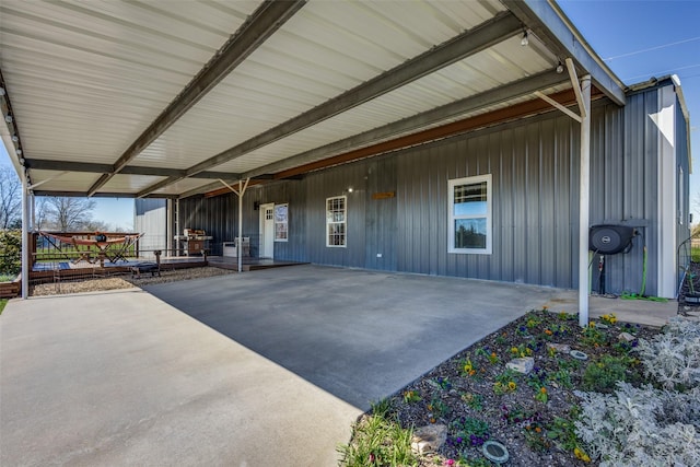 view of patio featuring an attached carport