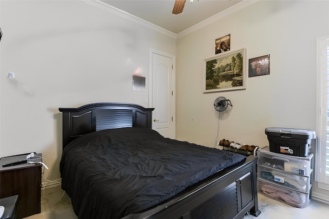 bedroom with crown molding, carpet floors, and a ceiling fan