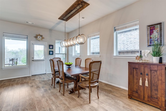 living room featuring recessed lighting, ceiling fan, a stone fireplace, and wood finished floors
