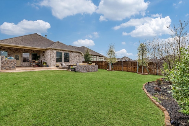 view of yard with a patio and a fenced backyard