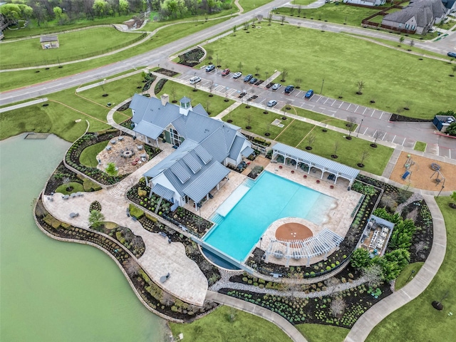 aerial view with a water view and a residential view