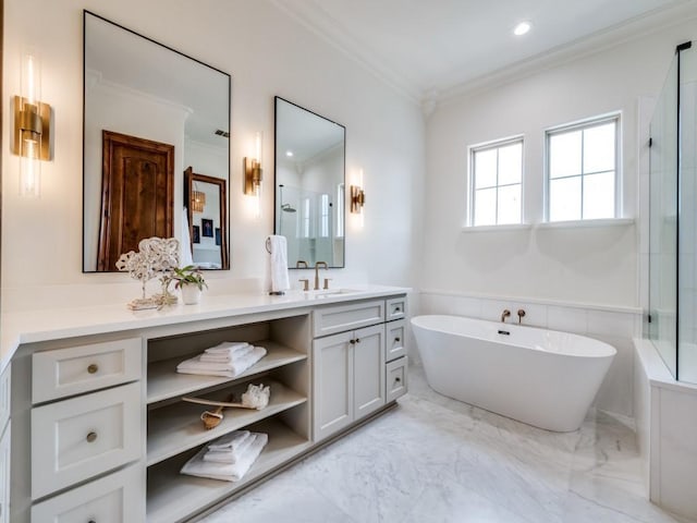 bathroom featuring crown molding, an enclosed shower, a wainscoted wall, a freestanding tub, and vanity