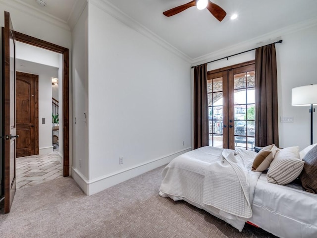 carpeted bedroom with crown molding, a ceiling fan, access to outside, and french doors