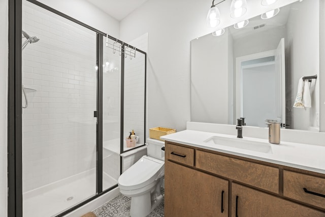 bathroom with a shower stall, visible vents, toilet, and vanity