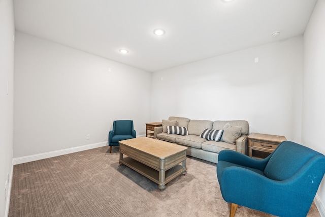 living area with baseboards, carpet floors, and recessed lighting