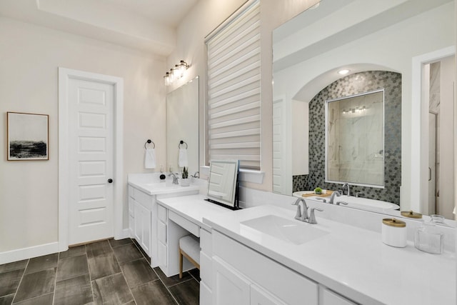 1030 Lone Grove Ln, Prosper, TX 75078 - bathroom with baseboards, tiled shower, and vanity