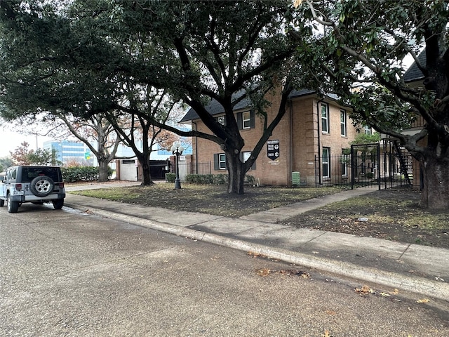 7828 Meadow Park Dr Unit 106, Dallas, TX 75230 - property entrance featuring french doors, a balcony, and fence