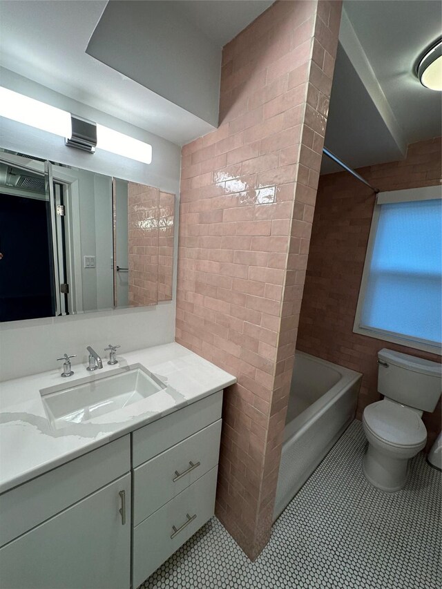 7828 Meadow Park Dr Unit 106, Dallas, TX 75230 - bathroom featuring bathing tub / shower combination and visible vents