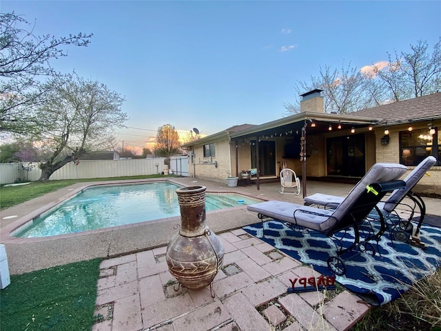 view of pool with a fenced backyard, a patio area, and a fenced in pool
