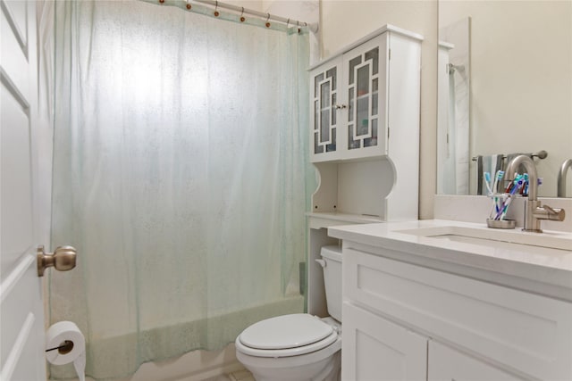 full bathroom with toilet, vanity, and shower / tub combo with curtain
