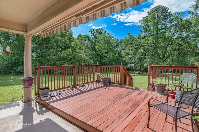 deck featuring a yard