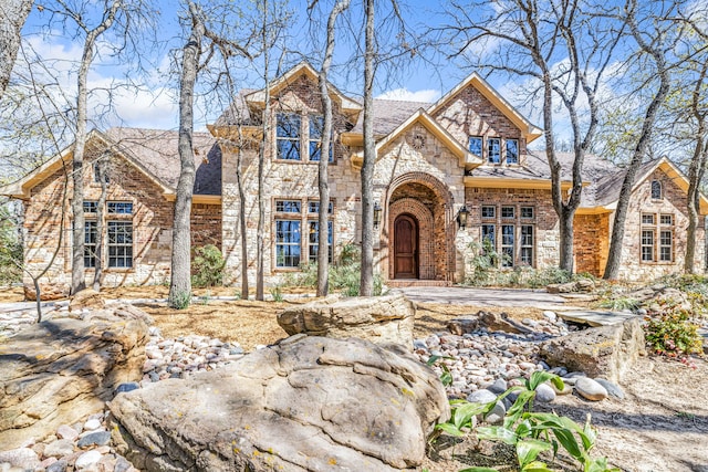 621 Alexandrite Dr, Oak Point, TX 75068 - view of front facade with stone siding and brick siding