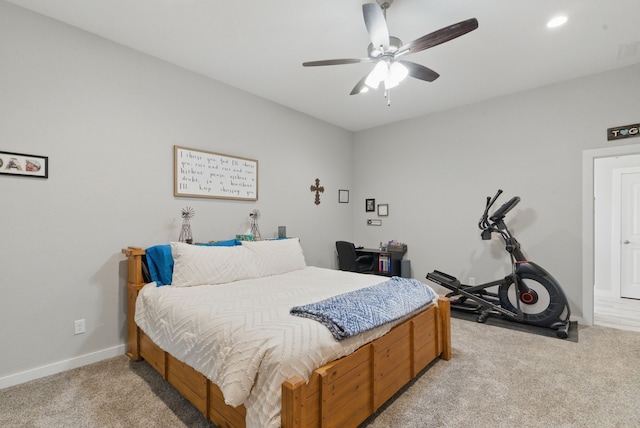 carpeted bedroom with a ceiling fan, baseboards, and recessed lighting