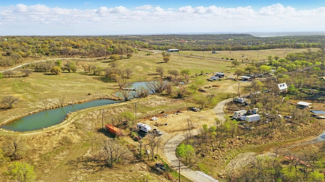 aerial view with a water view and a rural view
