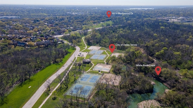 6814 Blackwood Dr, Dallas, TX 75231 - aerial view of property and surrounding area with a heavily wooded area