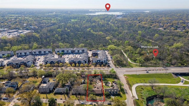 6814 Blackwood Dr, Dallas, TX 75231 - aerial perspective of suburban area with a heavily wooded area and property boundaries highlighted