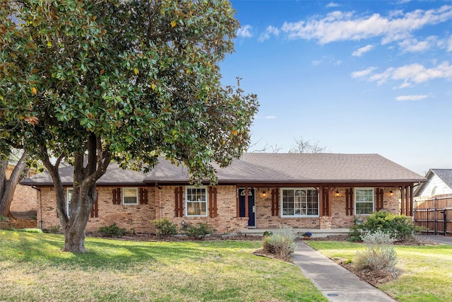 6814 Blackwood Dr, Dallas, TX 75231 - ranch-style home with brick siding, roof with shingles, and a porch