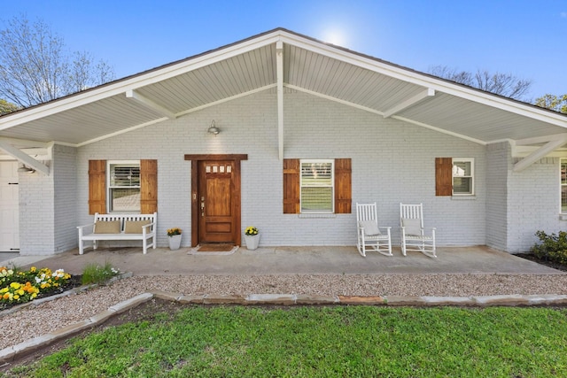 3612 Grandview Dr, Grapevine, TX 76051 - property entrance featuring brick siding and covered porch
