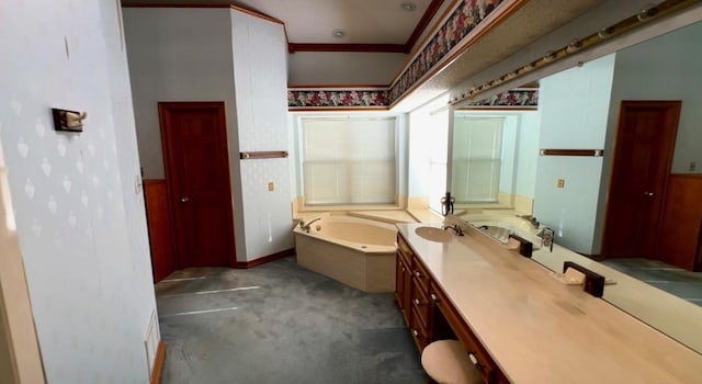 full bathroom featuring a garden tub, vanity, and wainscoting