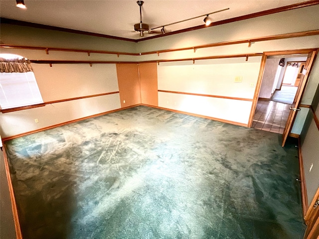garage featuring baseboards and a garage door opener