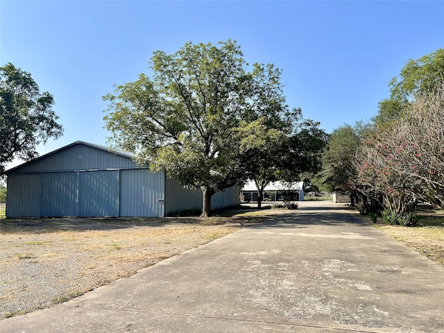 view of street featuring a pole building