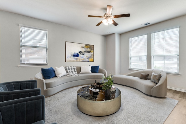 2004 Saddle Way, Mesquite, TX 75149 - living room with visible vents, baseboards, a ceiling fan, and wood finished floors