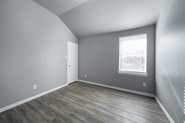 116 Birdbrook Dr, Anna, TX 75409 - empty room with baseboards, lofted ceiling, and dark wood-style floors