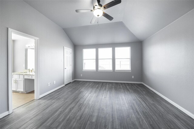116 Birdbrook Dr, Anna, TX 75409 - interior space featuring vaulted ceiling, dark wood-style flooring, baseboards, and a ceiling fan