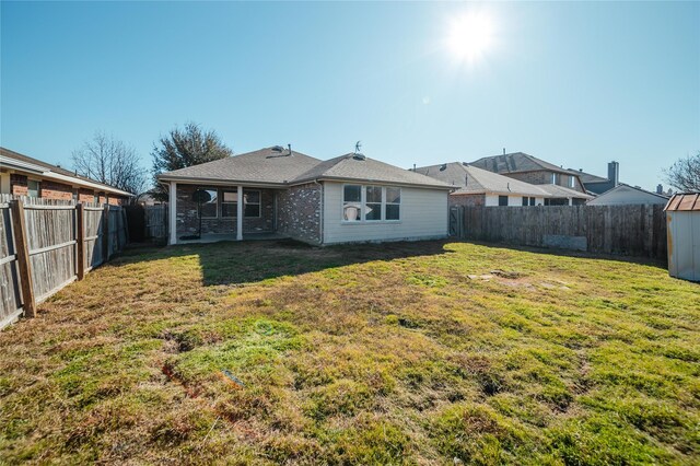 116 Birdbrook Dr, Anna, TX 75409 - rear view of house with a lawn and a fenced backyard