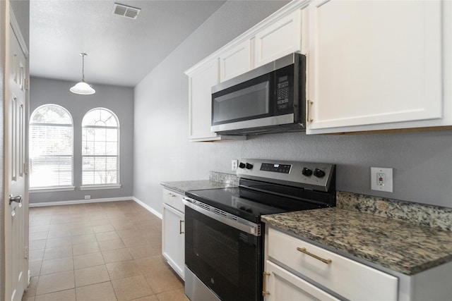 116 Birdbrook Dr, Anna, TX 75409 - kitchen featuring light tile patterned flooring, visible vents, white cabinets, and appliances with stainless steel finishes