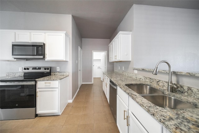 116 Birdbrook Dr, Anna, TX 75409 - kitchen featuring white cabinetry, a sink, light tile patterned floors, and appliances with stainless steel finishes