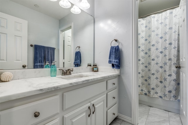 8106 Persimmon St, Irving, TX 75063 - full bathroom featuring vanity, marble look tiles, and shower / bathtub combination with curtain