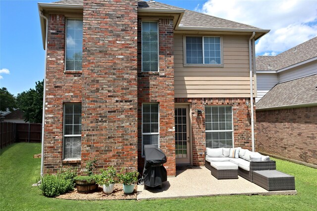 8106 Persimmon St, Irving, TX 75063 - back of house with an outdoor living space, a patio area, roof with shingles, and brick siding