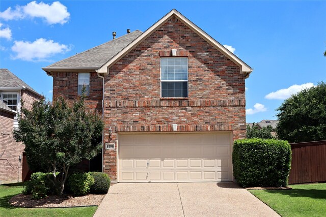 8106 Persimmon St, Irving, TX 75063 - traditional home with concrete driveway, a garage, brick siding, fence, and a shingled roof