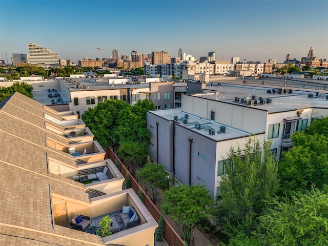 birds eye view of property with a view of city
