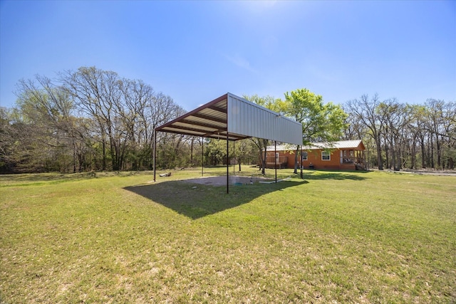 view of yard with a carport